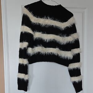Elegant Black and Cream Striped Sweater